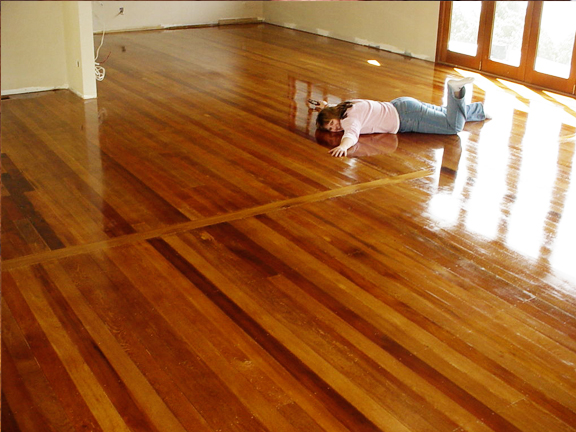 What are some tips for refinishing wood floors?